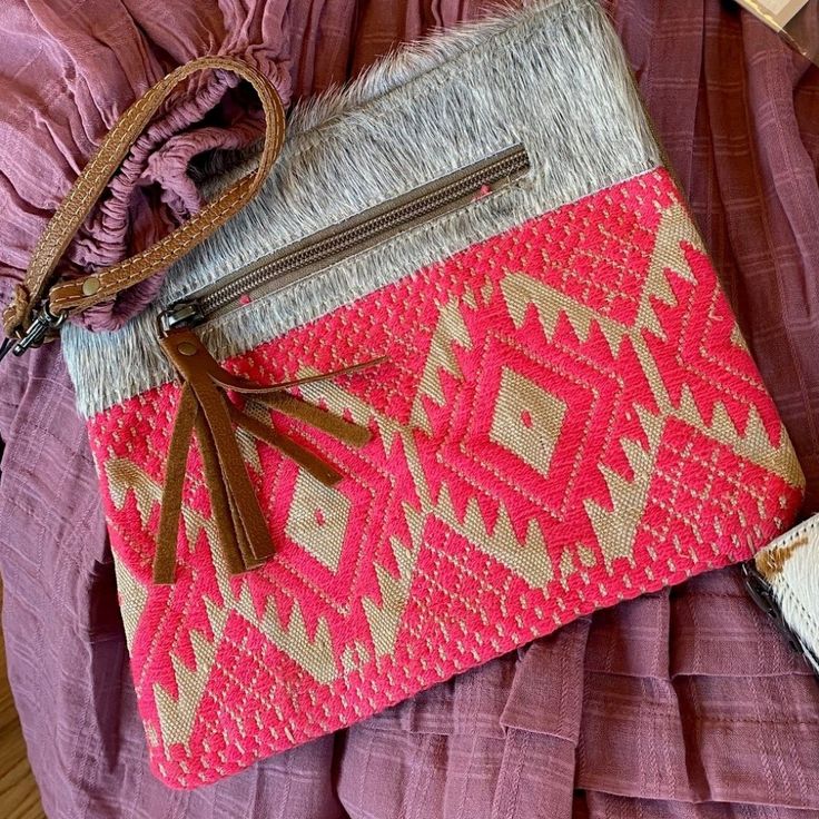 The Color Of The Season Is Pink! This Adorable Up-Cycled Canvas, Leather And Cowhide Wristlet Can Perform A Myriad Of Functions. Use It To Hold Makeup, Brushes And Tools, Jewelry, Hair Accessories, Or Stick It In Your Myra Weekender Bag To Safe Keep Loose Items. You Ca Also Pair This Cutie With Booties And Dresses Or Jeans And Flip Flops! **2 Available Nwt Ready To Ship!** Genuine Stitched Leather Cowhide Hair Zipper Closure Pink And Cream Woven Vintage Style Front And Neutral Upcycled Canvas Ba Pink Shoulder Bag With Zipper Pouch, Pink Handheld Pouch For Everyday Use, Travel Clutch With Zipper Pouch In Pink, Pink Travel Clutch With Zipper Pouch, Travel Pink Clutch With Zipper Pouch, Pink Rectangular Clutch With Removable Pouch, Pink Clutch With Zipper Pouch For Travel, Trendy Pink Pouch With Removable Section, Trendy Pink Pouch With Removable Pouch