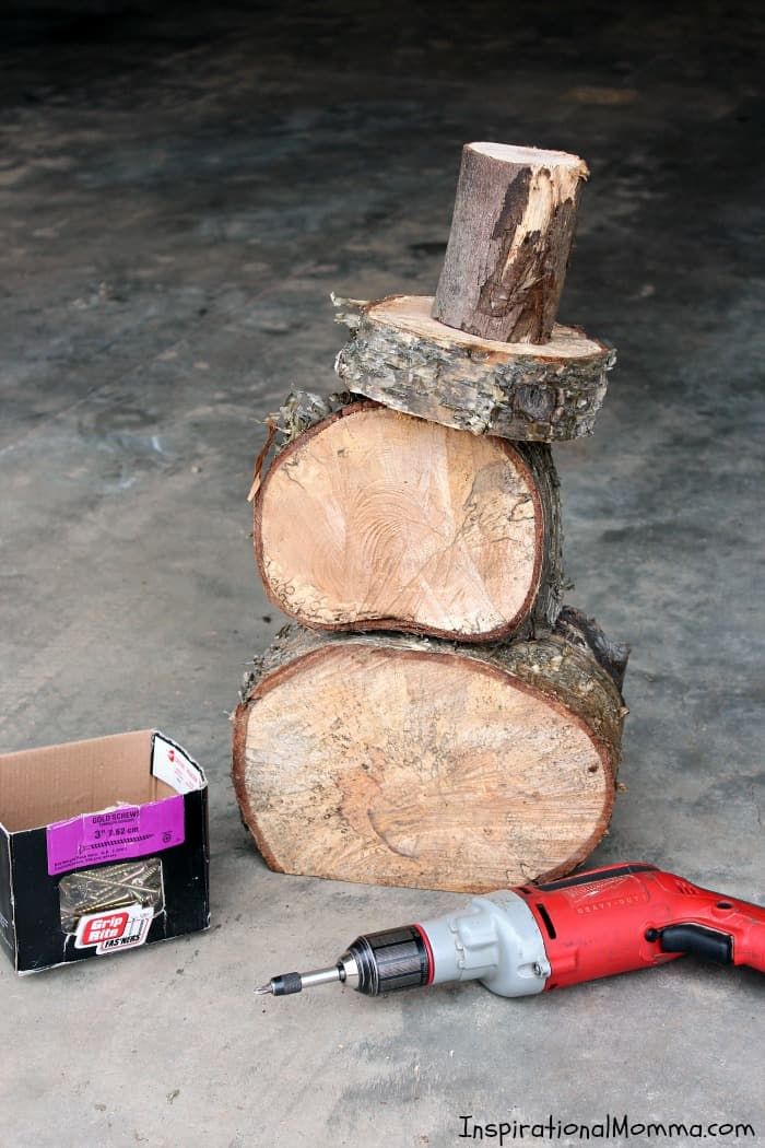 a piece of wood sitting next to a tool