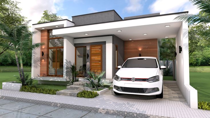 a white car is parked in front of a modern house with wooden doors and windows