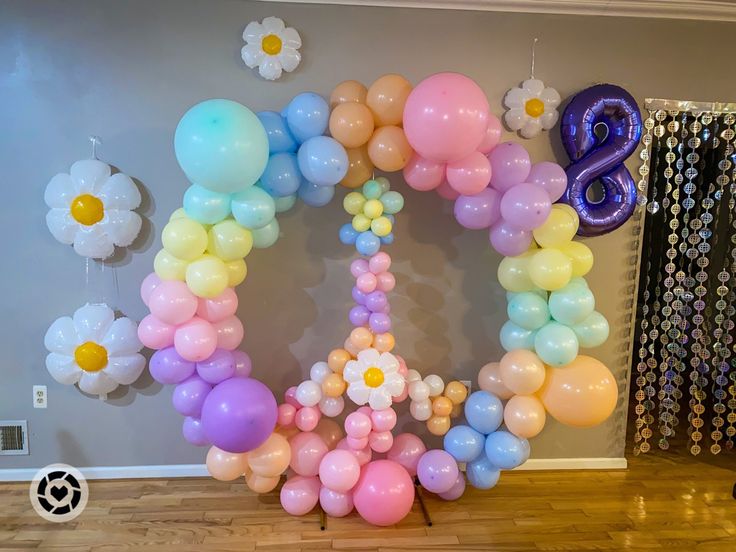 balloons are arranged in the shape of a peace sign