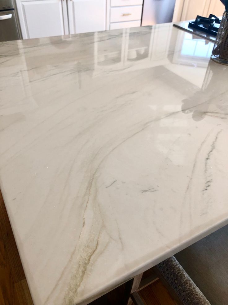 Quartzite, natural stone, kitchen, countertops White Beige Countertops, 2023 Quartz Countertops, White And Beige Granite Countertops, White Quartz Countertop Gold Veins, Patriotic Quartz Countertop, Bianco Avion Marble Countertops, White Countertop With Gold Veins, Light Colored Countertops, Quartz Countertops Gold Vein