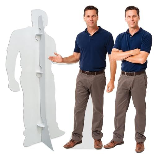 two men standing next to each other in front of a cut out of a man