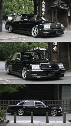 two black cars parked next to each other in front of a building