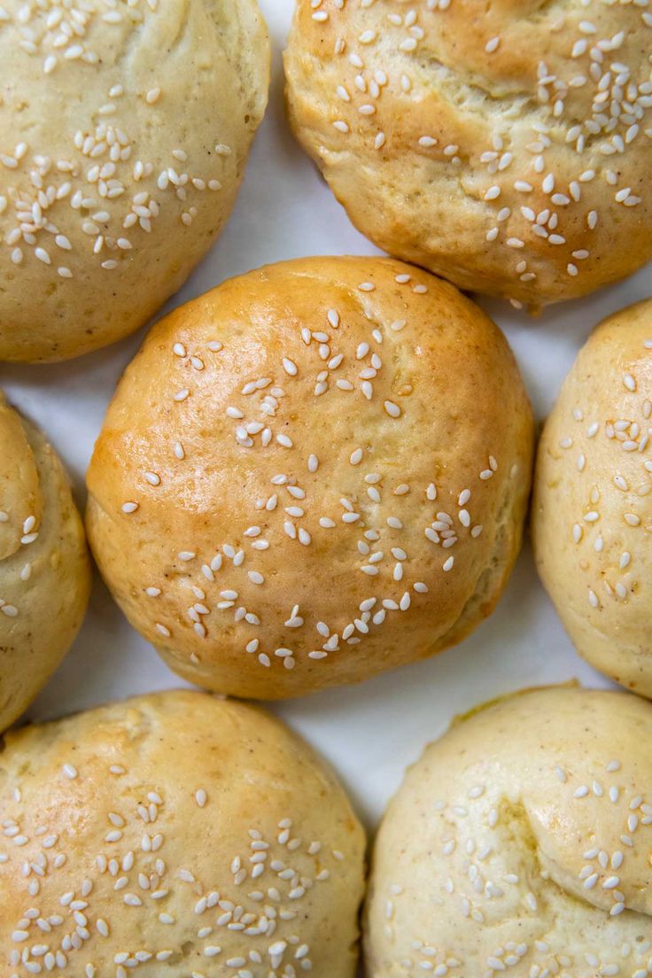 sesame seed rolls on a white plate