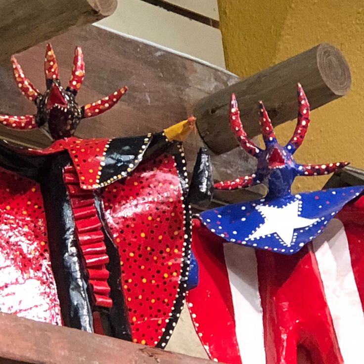 two red, white and blue decorations are on display