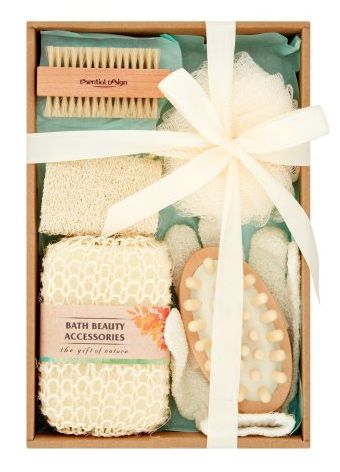 the bath gift set includes an orange and white shoe, soap, scrubs, toothpaste, and other personal care items