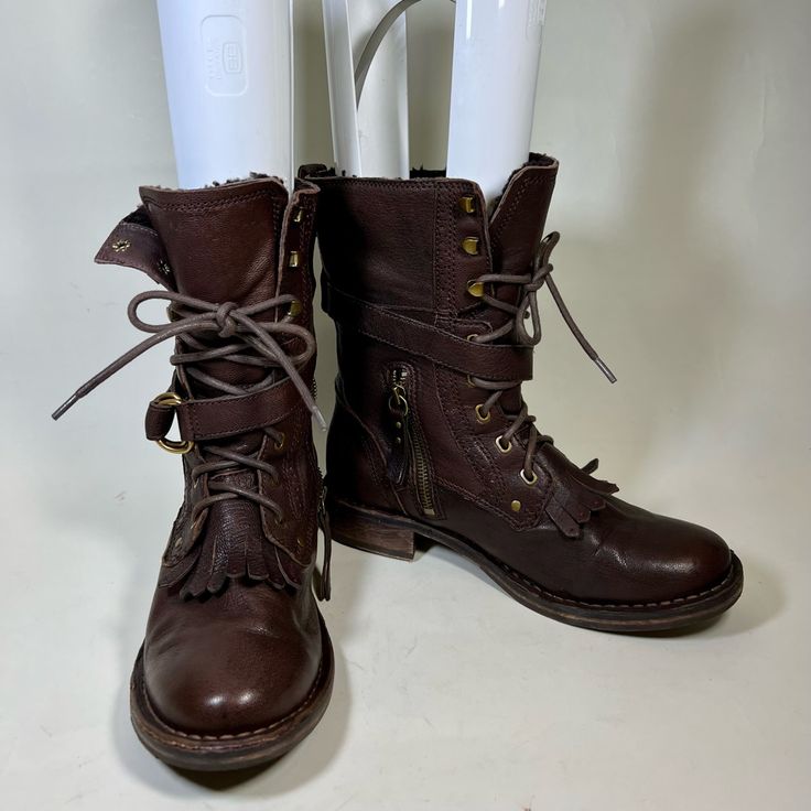 Ugg Mid Calf Moto Boots Condition 8/10 - Clean Interior Color: Brown Size: 8us Material: Genuine Leather Lining: Genuine Sheep Skin Leather Rubber Sole Shaft Height: 8.25” Calf Circumference: 6” Heel Height: 1.25” Ankle Circumference: 5.5” Style: F8913g Made In China $295 01cc Rugged Lace-up Moto Boots For Fall, Rugged Moto Boots With Round Toe For Fall, Leather Moto Mid-calf Boots For Fall, Moto Boots For Outdoor Fall Season, Leather Moto Combat Boots For Fall, Leather Mid-calf Moto Boots With Round Toe, Winter Leather Lace-up Moto Boots, Casual Moto Boots With Leather Footbed And Round Toe, Moto Boots With Round Toe For Fall