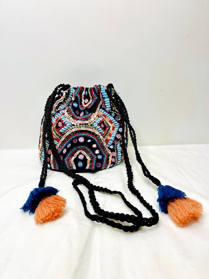 Black Mirror Potli Bag at Kamakhyaa by Pre Loved. This item is Bags, Casual Wear, For Mother, Mirror Work, Multicolor, Natural, Potli Bags Trending Bags, Bali Shopping, Bags 2024, Potli Bag, Sustainable Clothing Brands, Potli Bags, Womens Clothes, Embroidered Bag, Clothing Stores