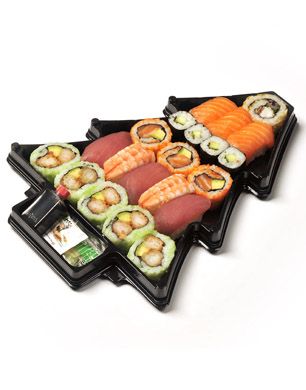 sushi platter with various types of sushi on it