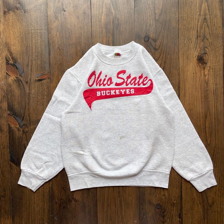 Vintage 1990s Ohio State Buckeyes College University Varsity Crewneck Sweatshirt / size Small Pit to Pit:    19" Length:     24" Sleeve:     26" Please check the measurements before purchasing  -------------------------------- ⚠️ Please Note: All of our items are vintage. Please note that with vintage clothing, items may show some signs of wear. We do our best to include as much information about the items condition as possible. Please look carefully through the photos and feel free to reach out Vintage College Sweatshirts, Varsity Crewneck, Rare Clothing, College Sweatshirt, Vintage Jerseys, College University, Ohio State Buckeyes, Ohio State, Fast Fashion