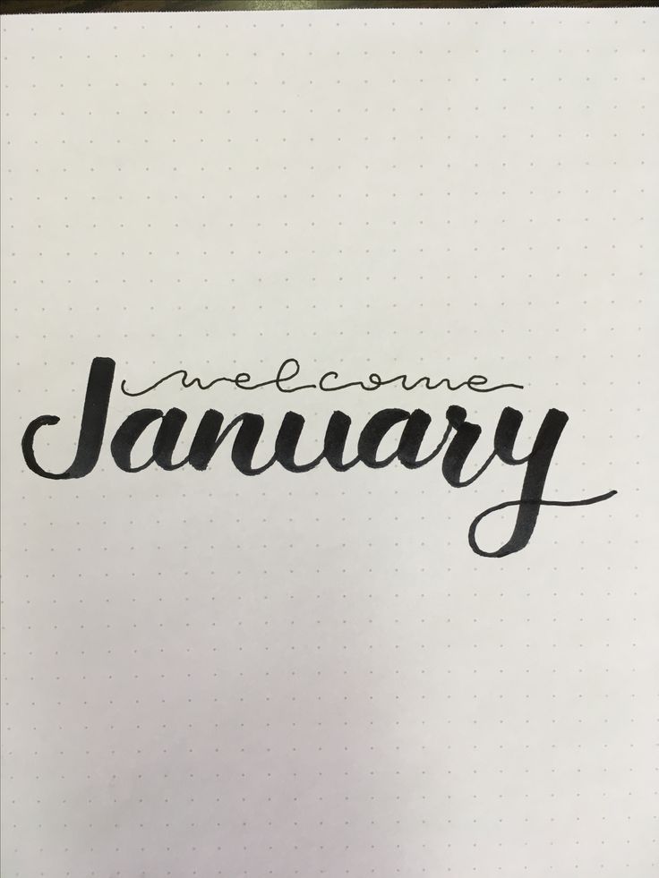 the word welcome january written in cursive writing on a white sheet of paper