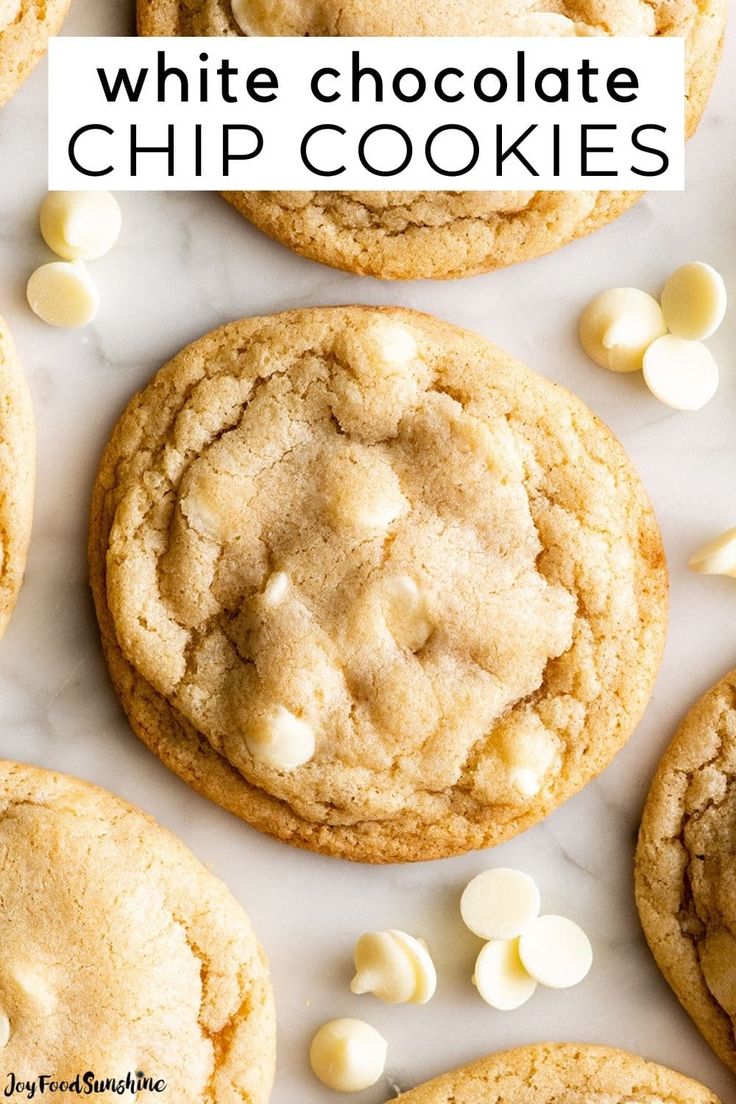 white chocolate chip cookies on a marble surface with text overlay that reads, white chocolate chip cookies