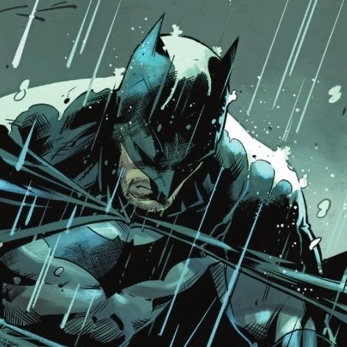 batman in the rain with his hands on his chest and eyes closed, looking down