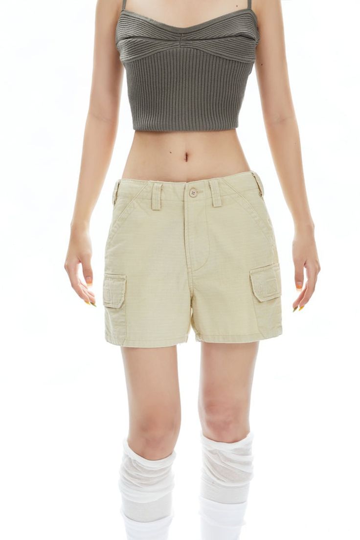 Discover the perfect blend of style and utility with our Slim Cargo Utility Shorts, a must-have for your casual wardrobe. Crafted from 100% cotton, these shorts offer a comfortable straight fit with a low waist design. The multiple pockets provide functionality without sacrificing the sleek silhouette, making them ideal for those who value practicality and a hint of edgy aesthetics. Effortlessly versatile, pair these shorts with a simple tee and sneakers for a laid-back look, or elevate with a b