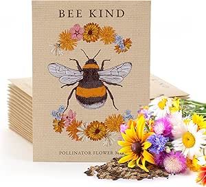 a bee kind card next to flowers and seeds