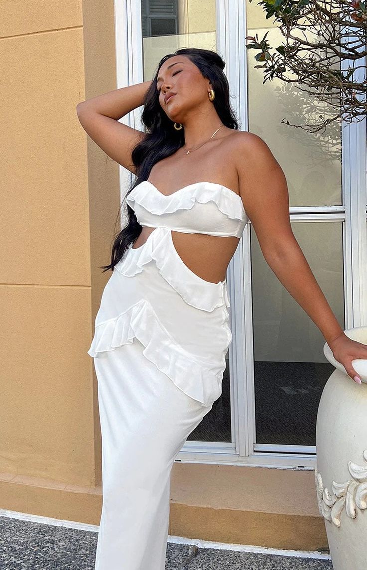 Ryder White Strapless Ruffle Maxi Dress ��– Beginning Boutique US Chic Strapless Maxi Dress With Ruffles, Chic White Midi Ruffle Dress, Flirty Strapless Ruffled Dress For Vacation, Party Strapless Ruffle Maxi Dress, Flirty Maxi Dress For Brunch, Ruffled Midi Dress With Sweetheart Neckline For Night Out, White Maxi Dress With Ruffled Skirt, Sweetheart Neckline Midi Dress With Ruffles For Night Out, Sweetheart Neckline Midi Dress With Ruffles For Day Out