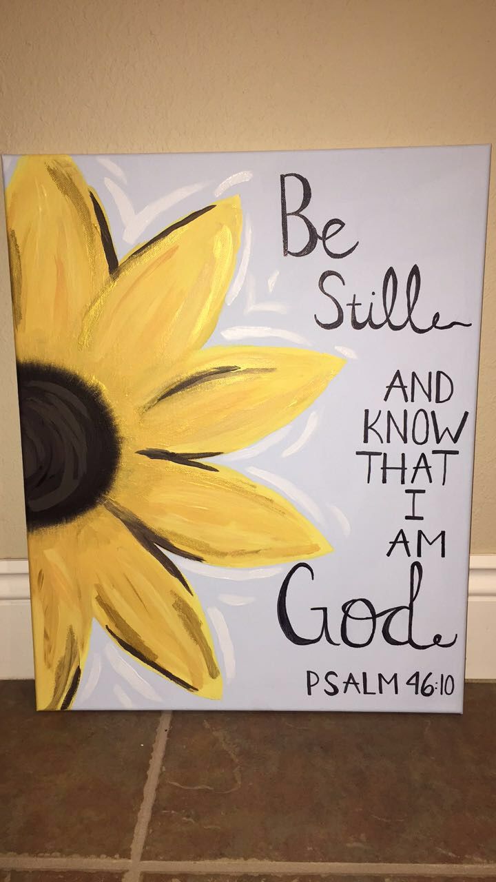 a sunflower painted on a canvas with the words be still and know that i am god