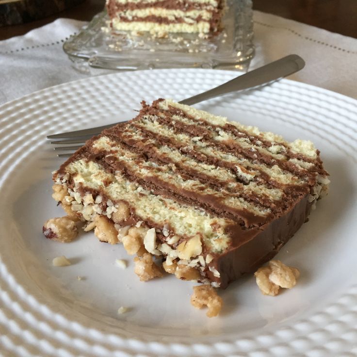 a piece of cake sitting on top of a white plate