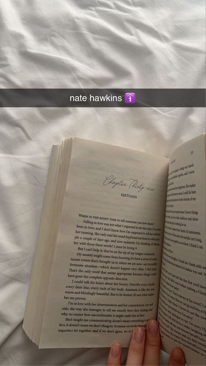 someone is reading a book in bed with the caption's name on it