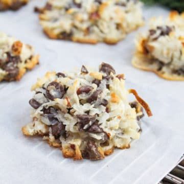 cookies with chocolate chips and coconut flakes on a baking sheet