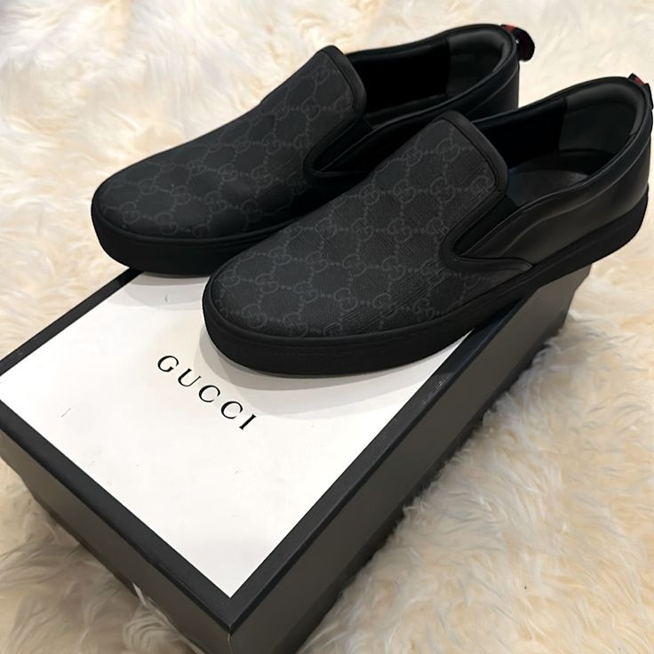 Brand New! Never Worn! Gorgeous Leather, Black, Men’s Slip On Sneakers With Ggs Design In The Front Of The Shoe. Comes With Dust Bags Original Box Original Gucci Gift Bow Gucci Tags Gucci Gift Box Men, Black Gucci Sneakers, Gucci Slip On Sneakers, Black Gucci Shoes, Tenis Gucci, Gucci Mens Sneakers, Gucci Sneaker, Gucci Gift, Silver Dress Shoes