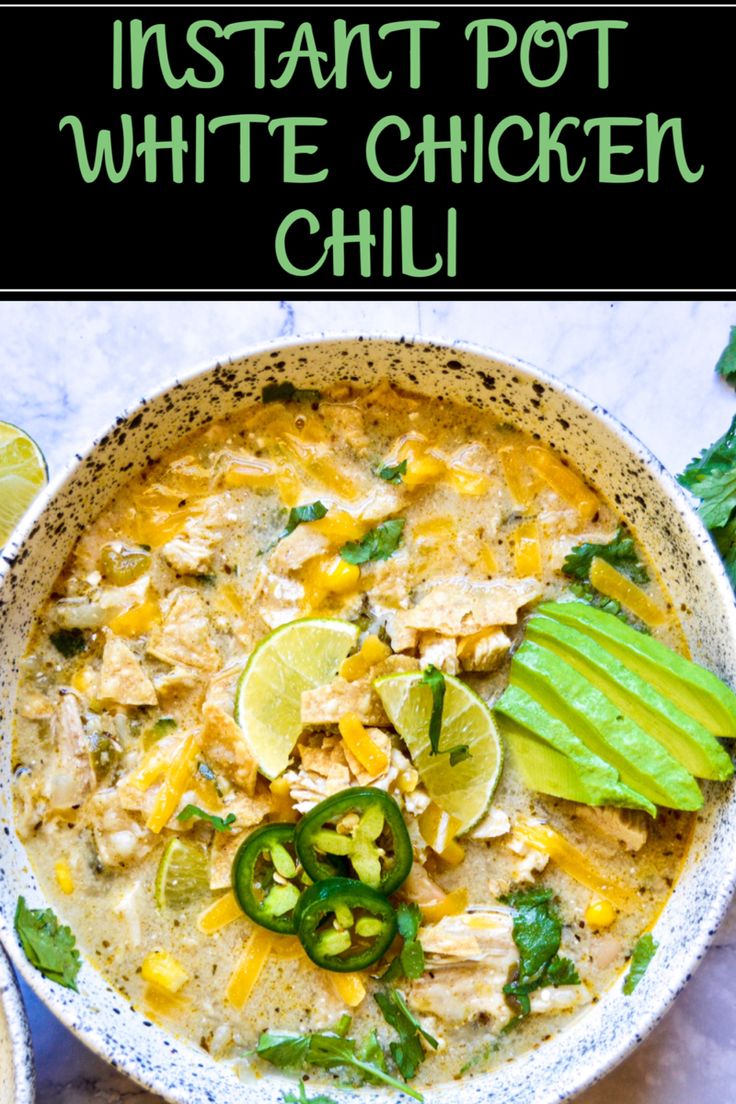 instant pot white chicken chili in a bowl with limes and jalapenos