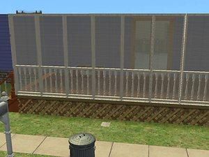 a screenshot of a fenced in area with a trash can next to it