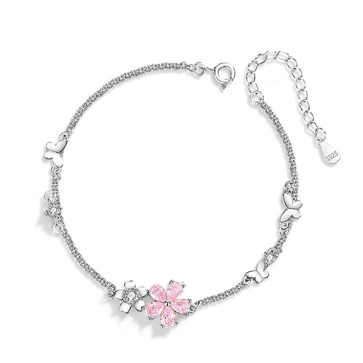 Description & Details Immerse yourself in the ethereal beauty and fleeting nature of cherry blossoms with our exquisite pieces inspired by these delicate blooms. Each design in our collection is meticulously crafted to capture the grace and elegance of cherry blossoms in full bloom. • Material: Solid 925 Sterling Silver ∙ Cubic Zirconia• Finish: Hypoallergenic ∙ Gold Plating• Dimensions: 16 - 19 cm chain, adjustable• All our work is custom made by hand with love Soft Jewelry Aesthetic, Sakura Bracelet, Cherry Blossom Bracelet, Birthday Wish List, Cherry Blossom Jewelry, Blossom Bracelet, Double Chain Bracelet, Blossom Jewelry, Pink Cherry Blossom