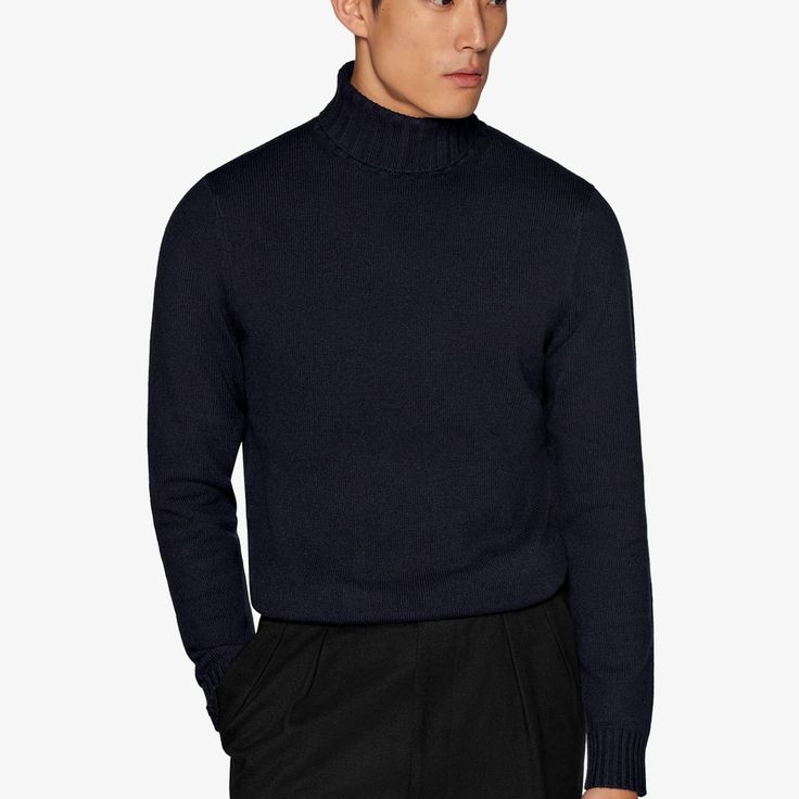 A versatile shade meets a classic winter style in this luxurious navy turtlneck sweater-wear it on its own or pair it with a jacket for a casually refined take on seasonal styling. Formal Wool Turtleneck Sweater, Wool Turtleneck Sweater For Formal Occasions, Navy Fine Knit Sweater For Fall, Blue Ribbed Collar Turtleneck For Winter, Blue Ribbed Turtleneck For Winter, Classic Turtleneck With Ribbed Collar For Work, Classic Turtleneck Sweater For Work, Classic Navy Fine Knit Sweater, Formal Winter Turtleneck Sweater