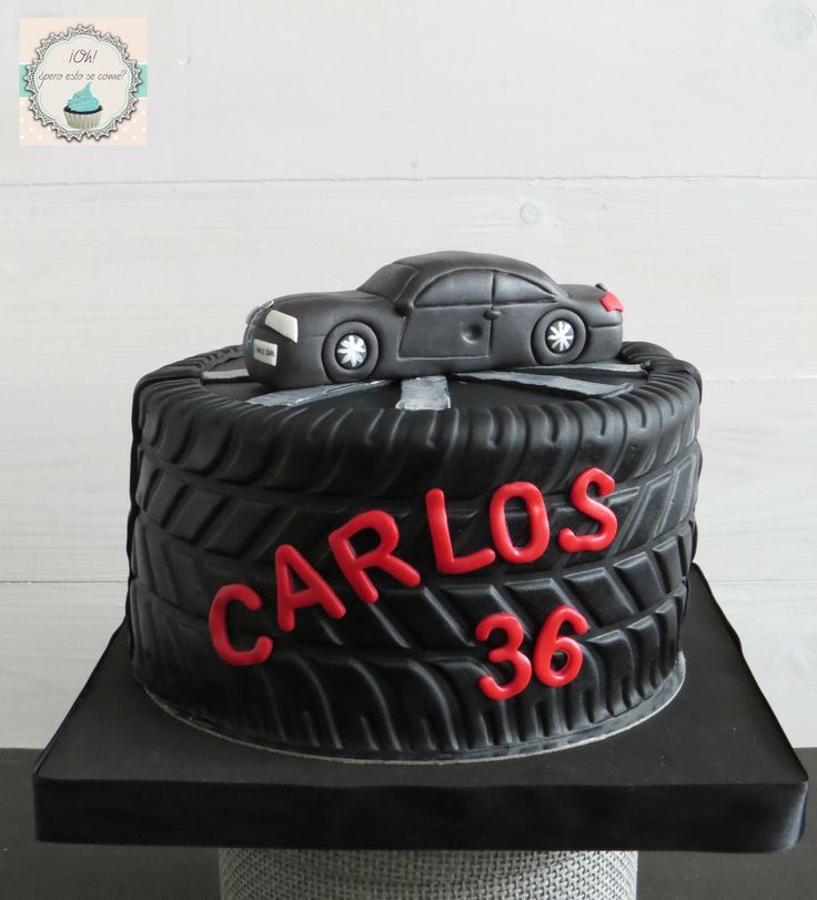 a cake that is shaped like a car with the number 35 on it's side