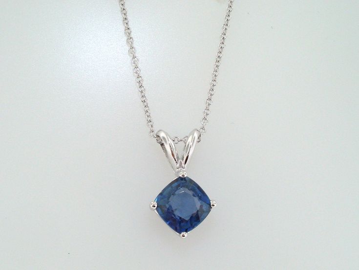 "HERE IS BEAUTIFUL CUSHION CUT CEYLON BLUE SAPPHIRE SOLITAIRE PENDANT NECKLACE 14 KARAT WHITE GOLD AVAILABLE YELLOW OR ROSE GOLD TOO ASK ME PLEASE COMES WITH 16\" OR 18\" INCH CHAIN CENTER CUSHION CUT CEYLON BLUE SAPPHIRE VERY SWEET LIGHT BLUE COLOR & CLEAN SAPPHIRE !! CENTER SHAPE- CUSHION CUT CUT- VERY GOOD CLARITY- AA COLOR- BLUE CARAT- 1.16ct MEASUREMENT- 5.95 X 5.90 mm TOTAL 1.16 CARAT RETAIL PRICE IS OVER $2,800.00 COMES WITH $2,250.00 CERTIFIED APPRAISAL !! DREAM IT I\"LL MAKE IT SPEC Formal Sapphire Necklace Fine Jewelry, Luxury Blue Diamond-cut Necklace, Sapphire Diamond Cut Pendant Necklaces, Elegant Blue Hallmarked Necklace, Formal Sapphire Gemstone Necklace, Hallmarked Sapphire Necklace, Pendant Necklace With Sapphire In Diamond Cut, Sapphire Pendant Necklace With Diamond Cut, Fine Jewelry Blue Topaz Necklaces For Formal Occasions