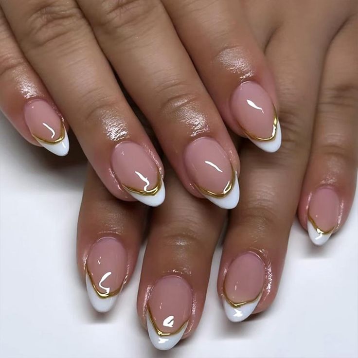 PRICES MAY VARY. Package About:White french tip false nails.The package contains 24 Pieces of medium almond press on nails of different sizes,1 adhesive tabs,1 small wooden stick,and 24 pieces nail glue stickers.You can safely choose a fake nail that fits your finger size Material:The gold line glue on nails are made of ABS materials.The nude glossy full cover stick on nails reusable with moderate thickness are not easy to break,use the nail glue sticker we gave you,stick on nails is brings you a comfortable experience Easy to Apply:White french tip stick on nails.Trim and clean your natural nails first,choose the right size and apply our nail tape,then press on the nails for 10 seconds.A few simple steps will make it easy for you to get the effect of doing a nail salon at home.When removi White And Gold Tips Nails, Blue Gold French Nails, Golf French Tips Nails, White Tips With Gold Line, French Tip With Gold Accent Nail, White Nail Gold Tip, Gold Gel X Nail Designs, Gold Nails Acrylic French Tips, Gold Tipped French Nails