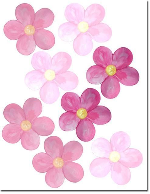 pink flowers with yellow centers are arranged in the shape of a flower on a white background