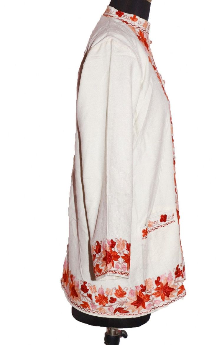 "Item Description From India Kashmiri , this traditional wool jacket heavily embroidered in crewel stitches. Background is ivory with rust and light brown crewel embroidery in traditional Kashmiri floral motif. This is an unusual color scheme for a Kashmiri wool jacket because all the colors are in the same fall palette, resulting in a very classy ombre effect. Measurements: Size Type: Regular Size (Women's):L Decade:1997s Jackets Two Pocket Jackets Bust/Chest Size - 44\" Inches Jackets Length - White Bohemian Outerwear With Intricate Embroidery, White Bohemian Embroidered Outerwear, Traditional Embroidered Cream Outerwear, Traditional Cream Outerwear For Spring, White Long Sleeve Outerwear With Chikankari Embroidery, White Chikankari Embroidery Long Sleeve Outerwear, White Long Sleeve Outerwear With Resham Embroidery, Crewel Stitches, Woolen Embroidery