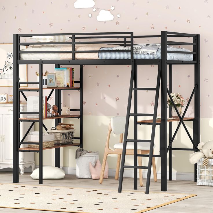 a black bunk bed with ladders next to a desk and chair in a child's room