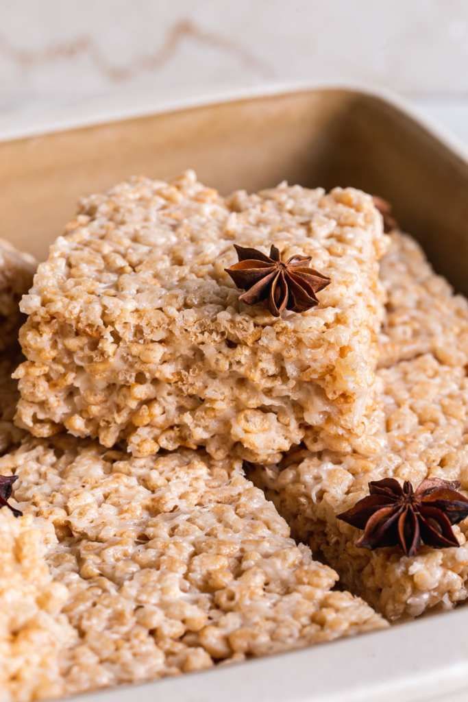 oatmeal bars with cinnamon star anise on top in a baking dish