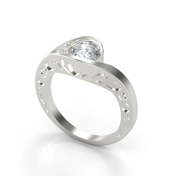 a white gold ring with a diamond in the center