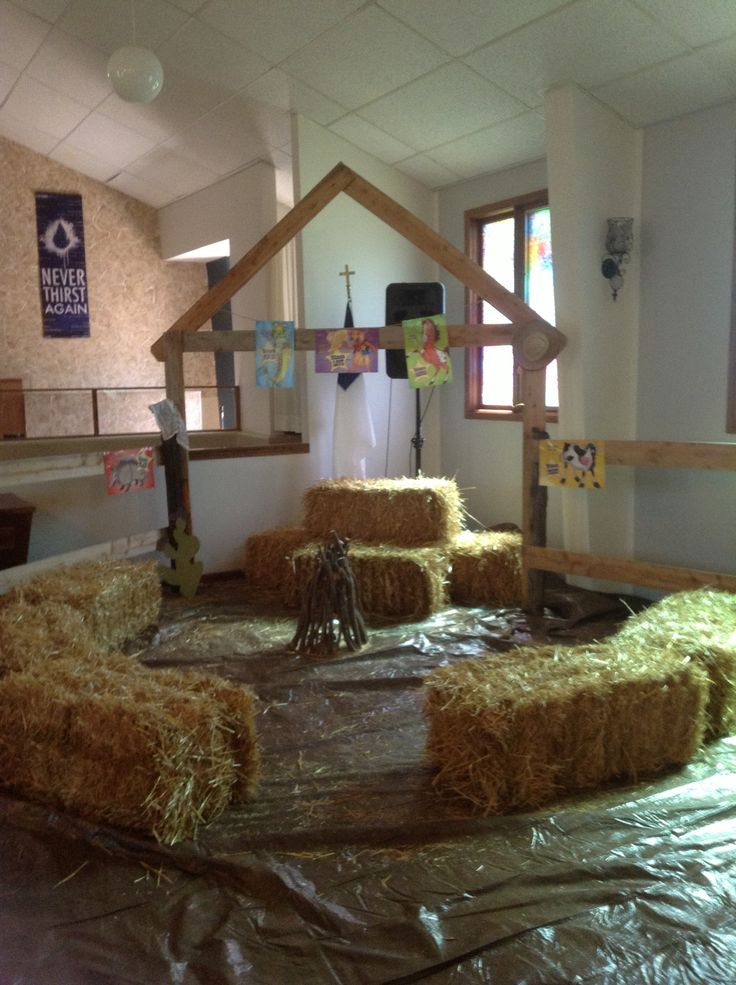 hay bales are placed in the middle of a room