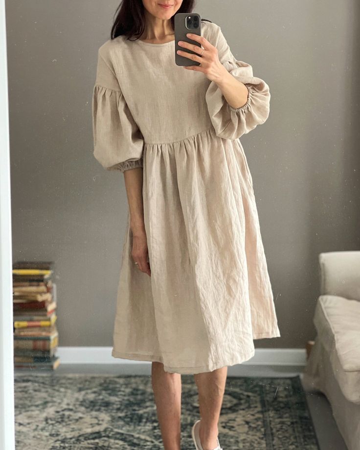 "* 100% soft linen * 3/4 sleeve, dropped shoulder * Loose fit * Pockets * Handmade in Slovakia * The model is 184 cm tall (bust 90/35,5\" - waist 73/29\" - hips 93/36,5\"),  - size S/M linen (sold out) - size XS/S red checks  - size S/M grey gingham - wearing size S/M, color white stripes (altered length +10 cm/4\") * The video: the color sky blue is no longer available. * This dress is designed to have a loose fit Measurements:  Size XS/S - cloth (laid on the floor): Bust: 50 cm /20\" Waist: 50 cm /20\" Length (from the neckline to the hem measured from the back):  93 cm / 36,5\" Length bodice (from the shoulder to the waistline seam): 36 cm/ 14,5\" -------------------------------- Size S/M - cloth (laid on the floor):  Bust: 54 cm /21,5\" Waist: 54 cm /21,5\" Length (from the neckline to Dresses Korean Style, Yellow Dress Casual, Grey Gingham, Beach Party Dress, Sweet Party, Linen Dress Women, Linen Shirt Dress, Oversized Dress, Strapless Mini Dress