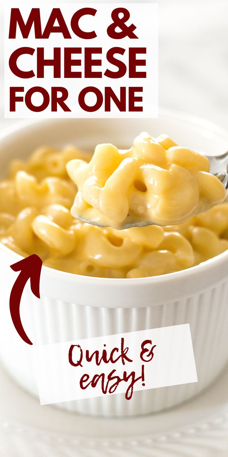 macaroni and cheese for one in a white bowl with a red arrow pointing to it