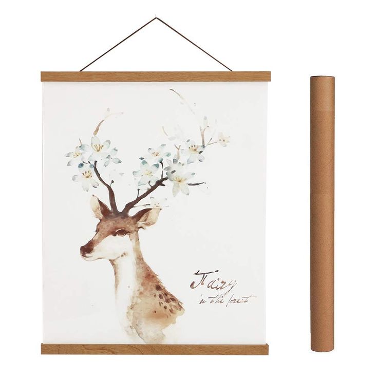 a painting of a deer with flowers on its antlers is hanging from a wooden frame