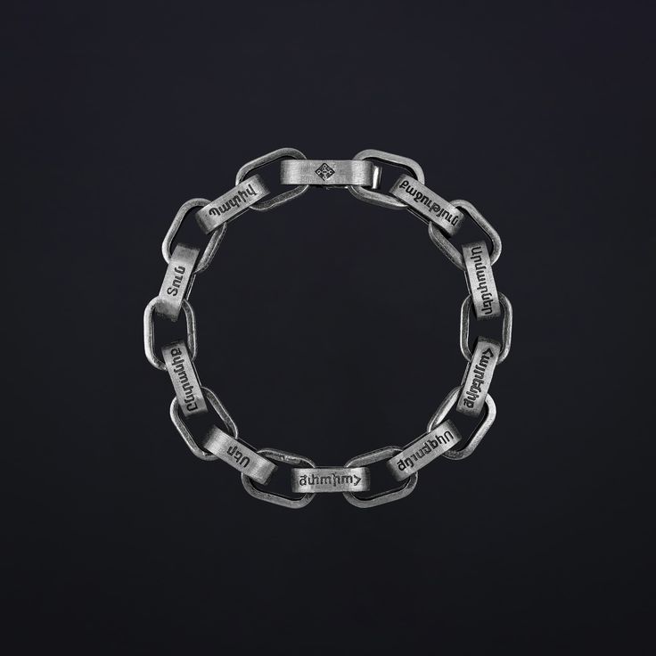 "Arjeqner" – a robust chunky chain bracelet, an embodiment of the national values held dear by Armenian men. Stamped with symbols reflecting strength, honor, and loyalty, this bracelet pays homage to those who stand as protectors and champions, fiercely devoted to both family and motherland. "Arjeqner" is not just a bracelet; it's a statement of resilience and love, proudly worn by those who cherish their heritage and carry their values with unwavering pride. Silver Chain Bracelet For Streetwear, Engraved Metal Chain Link Bracelet, Modern Engraved Link Chain Bracelet, Metal Link Bracelets With Engraving, Engraved Metal Link Bracelets, Armenian Men, Bespoke Jewellery, Earings Piercings, The National