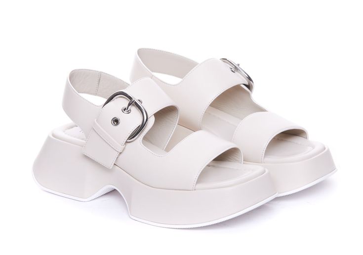 Vic Matie' white Travel sandals, lateral buckle closure, round toe, leather upper Composition: 100% Leather, Rubber Sole | Vic Matié Women's Travel Sandals in White | SS24 Travel Sandals, Golden Goose Shoes, Sneaker Wedge, Italian Luxury, Designer Sneakers, Tory Burch Shoes, Luxury Retail, Manolo Blahnik, Luxury Shoes