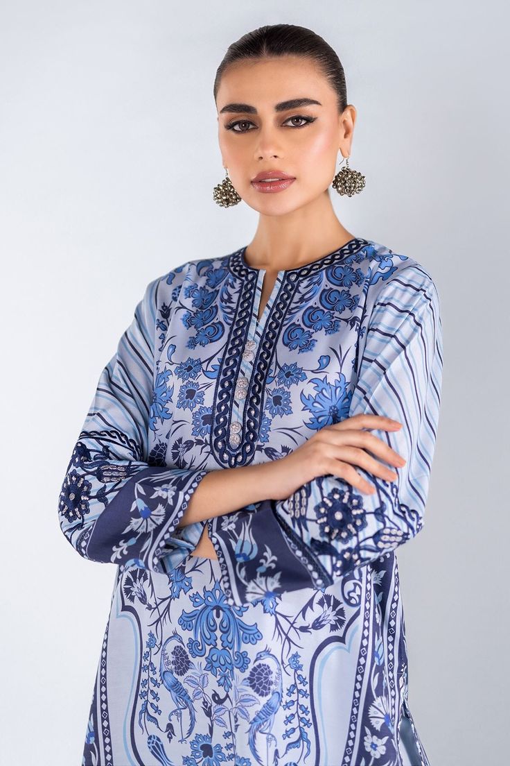 Khaadi EST24166 L Blue Eid Prets 2024 Original brand suit fabric and photography lite diffrance in actual print. Elegant Patterned Spring Sets, Elegant Floral Print Patterned Sets, Light Blue Printed Long Sleeve Set, Elegant Patterned Sets For Eid, Elegant Patterned Sets With Printed Motifs, Printed Silk Sets With Long Sleeves, Long Sleeve Blue Tops For Eid, Elegant Blue Set With Floral Print, Elegant Blue Sets With Floral Print