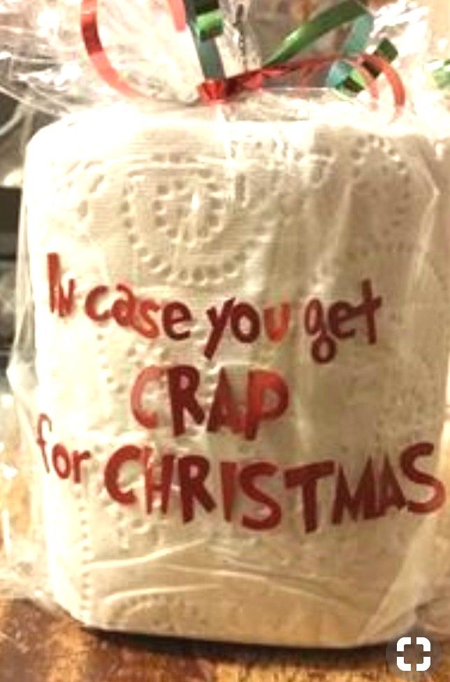 a bag that has been wrapped in plastic with the words crap for christmas written on it