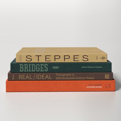 three books stacked on top of each other in front of a white background with the title'bridges real / ideal '