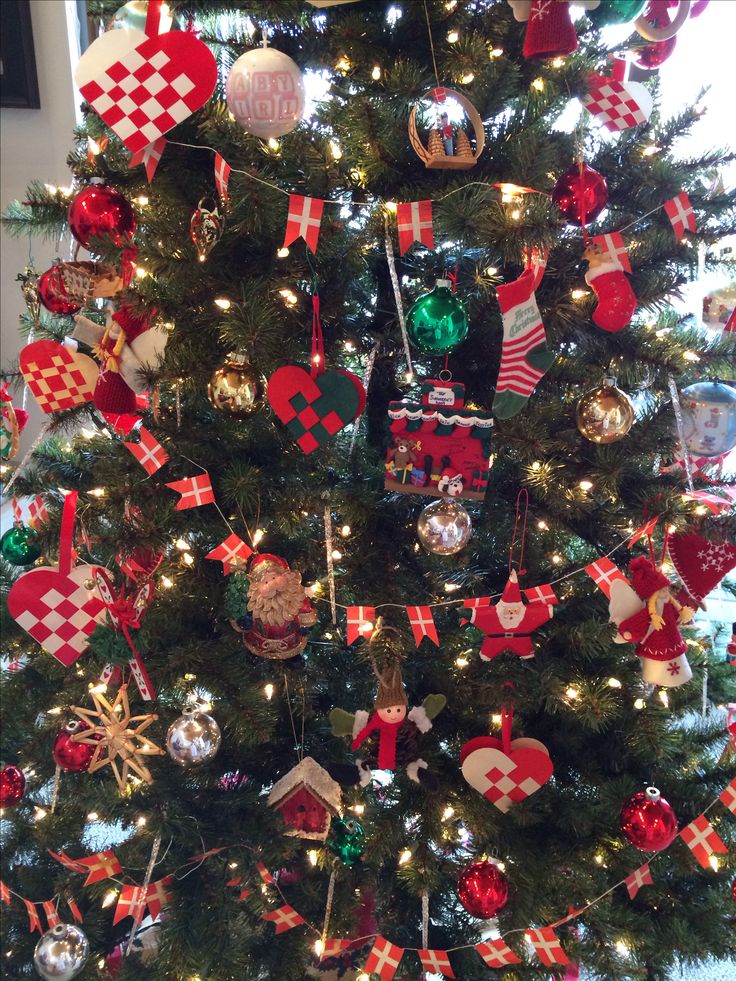 a decorated christmas tree with red and green ornaments