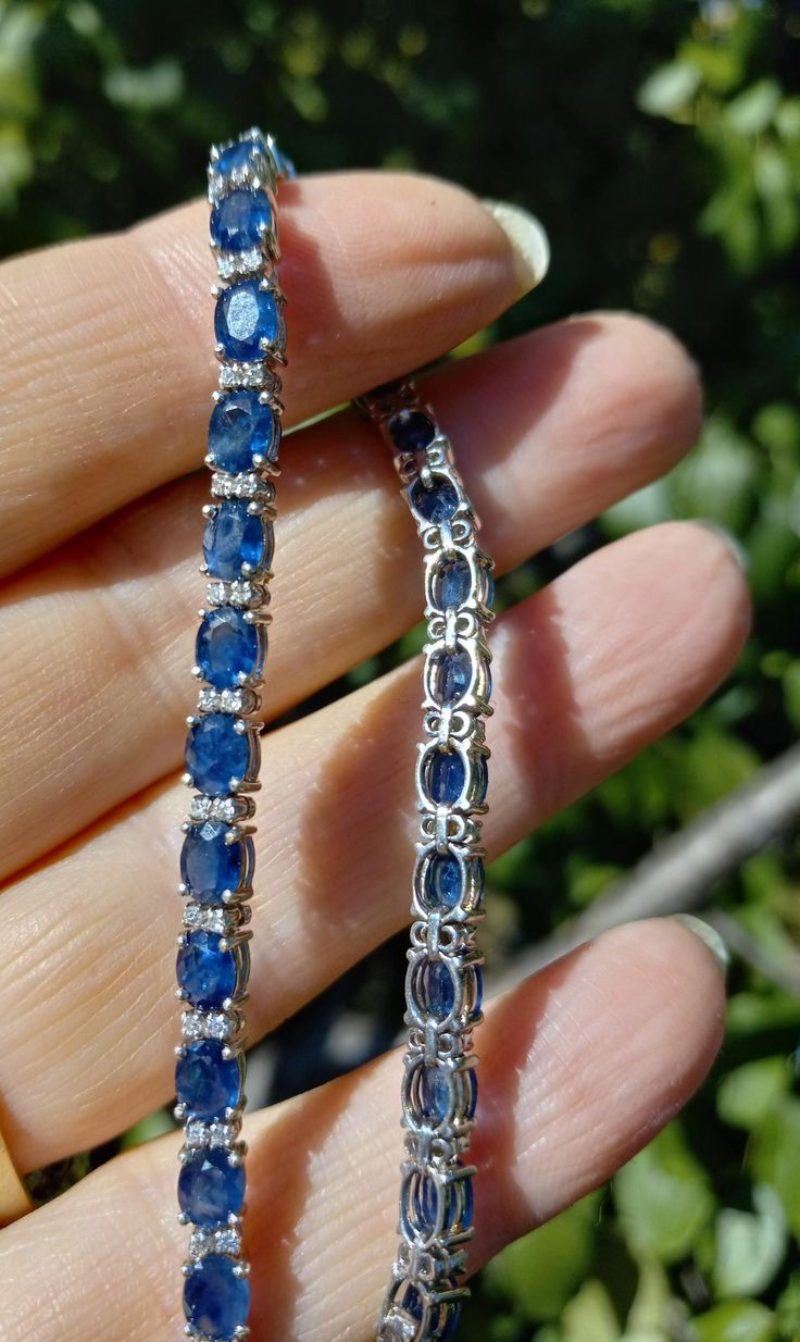 Beautiful 14k White Gold,  Diamond,  Blue Sapphire bracelet.. Bracelet is in good Pre Owned Vintage Condition  Some Pics ENLARGED to see details  Length 7 1/4.. All sales are Final no return  ALL ITEMS FROM MY SHOP MUST BE PURCHASED STRAIGHT THRU ETSY.COM WEBSITE ONLY  NOT THRU GOOGLE AND OTHERS OFFSITE ADS  NOT THRU ETSY APP ALL ORDERS MADE NOT THRU ETSY.COM WEBSITE WILL BE CANCELED  ETSY CHARGING ME EXTRA HIGH FEE FROM EACH SALE MADE NOT THRU ETSY.COM WEBSITE Luxury Elegant Sapphire Tennis Bracelet, Classic Sapphire Gemstone Tennis Bracelet, Elegant Blue Sapphire Tennis Bracelet, Luxury Sapphire Gemstone Tennis Bracelet, Luxury Blue Gemstone Tennis Bracelet, Blue Sapphire Bracelet, Sapphire Bracelet, Chain Link Bracelet, Link Bracelets