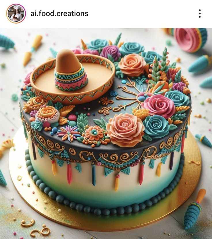 a colorful cake decorated with flowers and sombrero