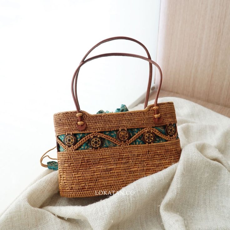 Kokonut Handwoven Rattan Handbag Bali – Lokatan Eco-friendly Brown Shoulder Bag For Vacation, Bohemian Brown Straw Bag With Large Capacity, Bohemian Brown Bucket Bag With Double Handle, Eco-friendly Shoulder Bag With Bamboo Handle For Daily Use, Brown Double Handle Straw Bag, Casual Brown Rectangular Straw Bag, Brown Handwoven Top Handle Bucket Bag, Eco-friendly Everyday Bags With Bamboo Handle, Eco-friendly Bag With Bamboo Handle